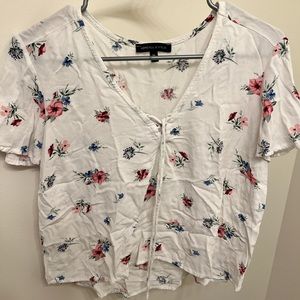 White flowery top.